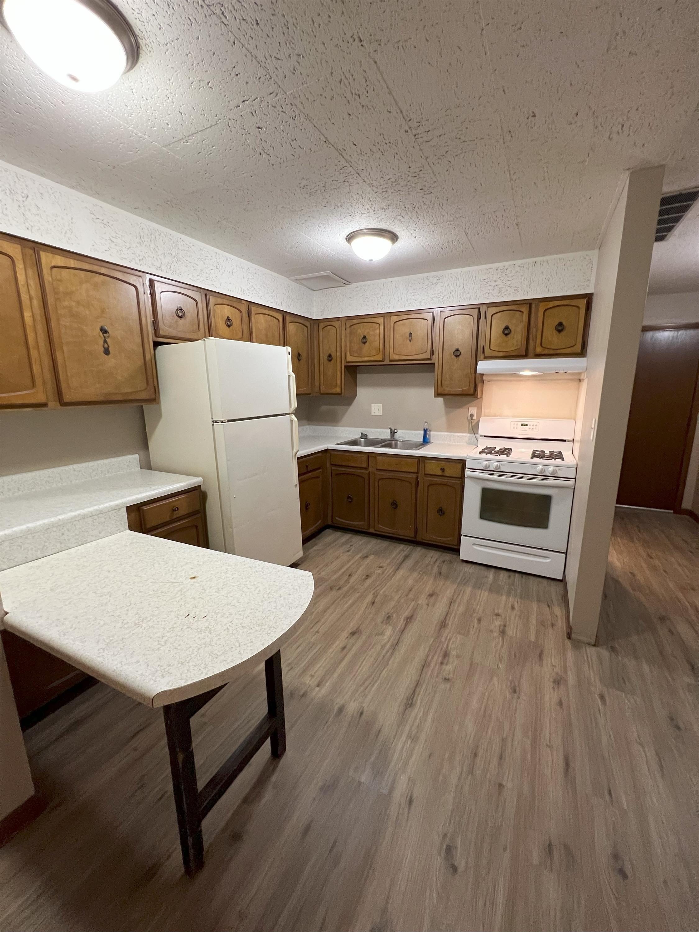 230 W. 3rd St., #305